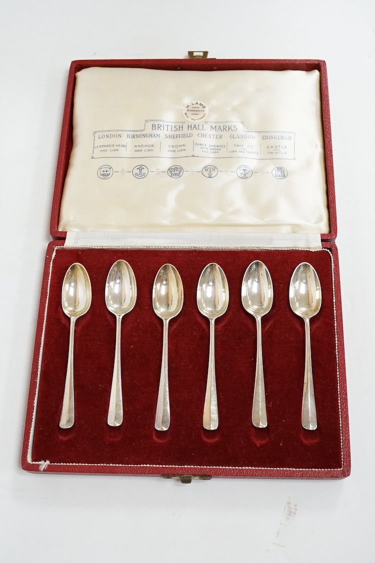 Three assorted silver christening sets including spoon, fork and napkin ring by William Hutton & Sons, London, 1896, one other set with steel knife, two cased sets of silver coffee spoons and a cased set of six Japanese